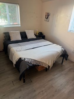 Steel bed frame with mattress