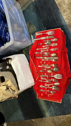 Silver-Tone Flatware Set in Red Roll Case