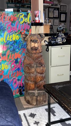 Wood carved bear for garden