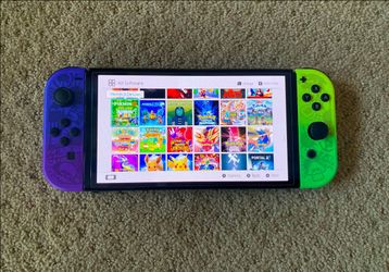 NINTENDO SWITCH OLED MOD + 512gb SD with 125 SWITCH GAMES + 7500 RETRO GAMES