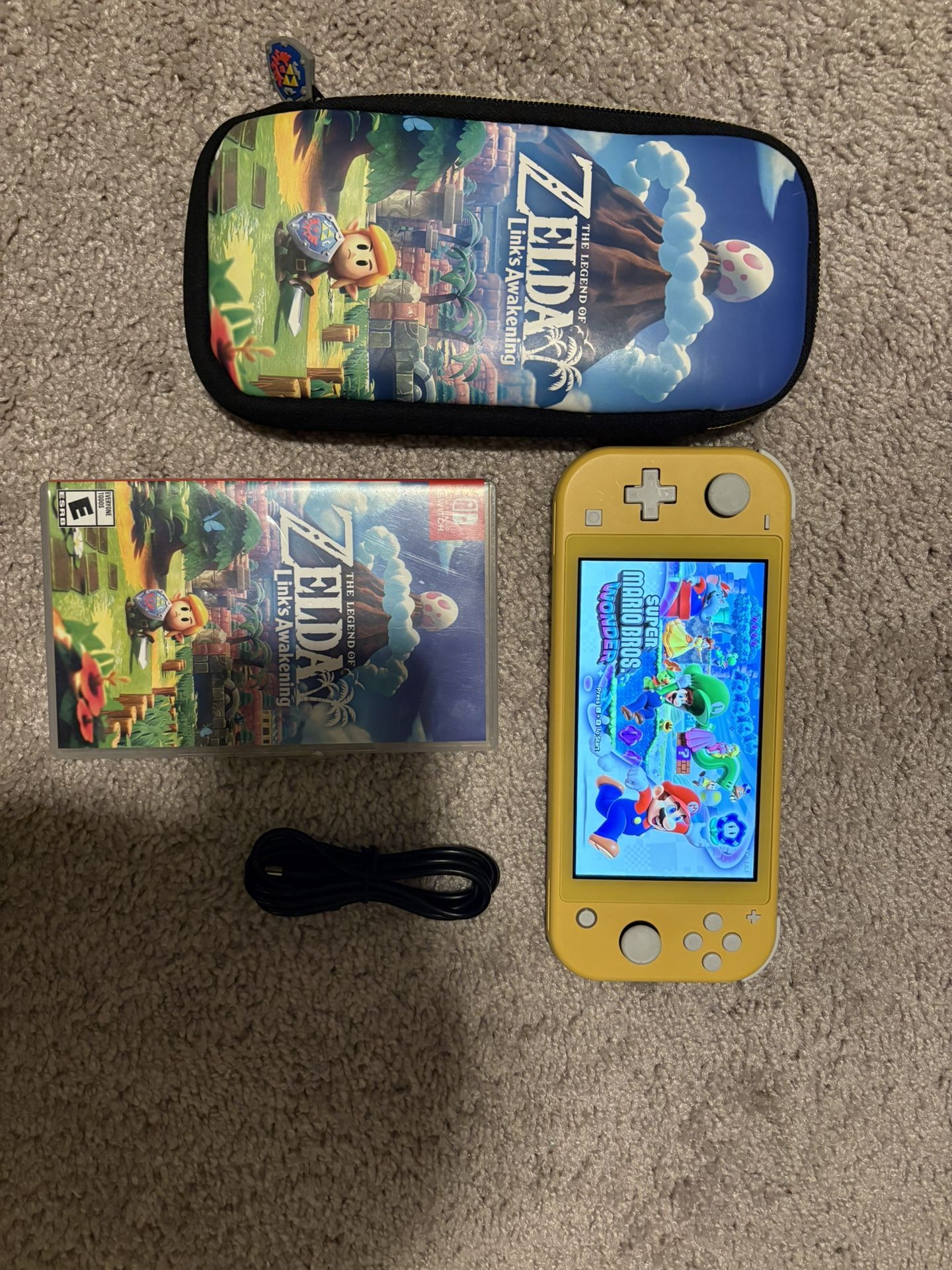 Switch Lite + 2 Games (hablo Espanol)