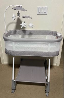 Simmons Kids' Shooting Star Rocking Bassinet with Airflow Mesh - Platinum: 360-Degree Swivel, Lockin