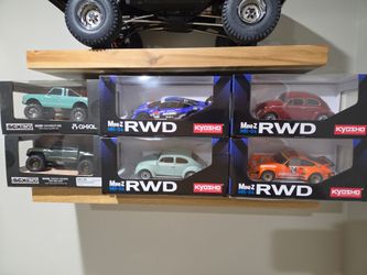 New in box kyosho mini z rtr rc cars and scx30 axial crawlers