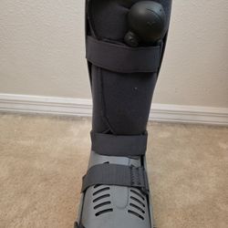  Össur Rebound Air Walker Boot, a medical-grade orthopedic device used to provide stability and protection for foot and ankle in