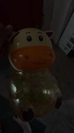 Cow shaped piggy bank