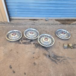 Cadillac Hub Caps .