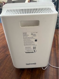 Air purifier with replaceable filters