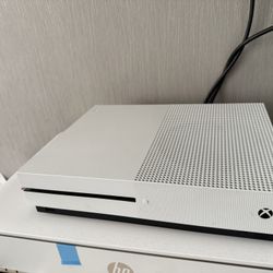 Xbox one S with Remotes and games