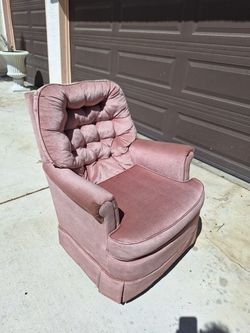 SWIRLING, ROCKING CHAIR