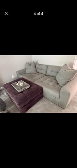 Modern Gray Couch and Ottoman from Jordan’s Furniture for sale