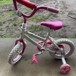 Huffy girls pink tricycle 