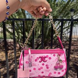 Juicy couture pink cherry wristlet 