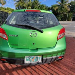 mazda 2, auto, cold air,  4-door, good in gas