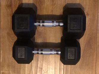Like NEW.! 20lb and 30lb each dumbbell