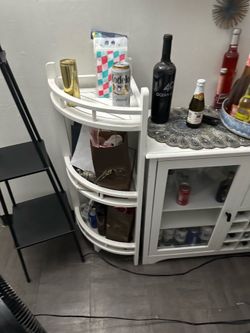 Wine/liquor bar and two white shelves