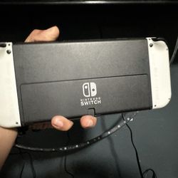 Nintendo Switch OLED with 2 Games