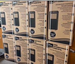 Portable air conditioning unit 13500 Btu cools 450 sq ft comes with window Kit