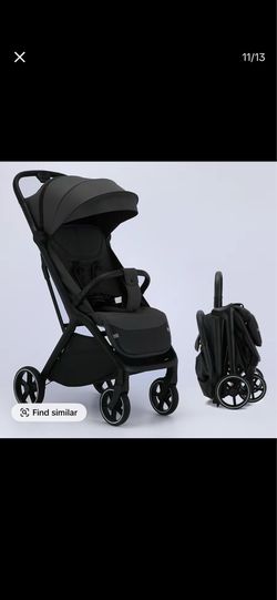 Foldable travel stroller