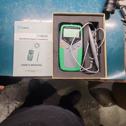 Handheld Tesla meter.