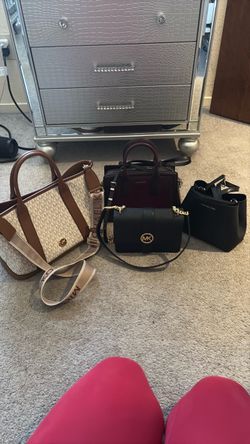 All 4 Michael Kors purses for 300.00