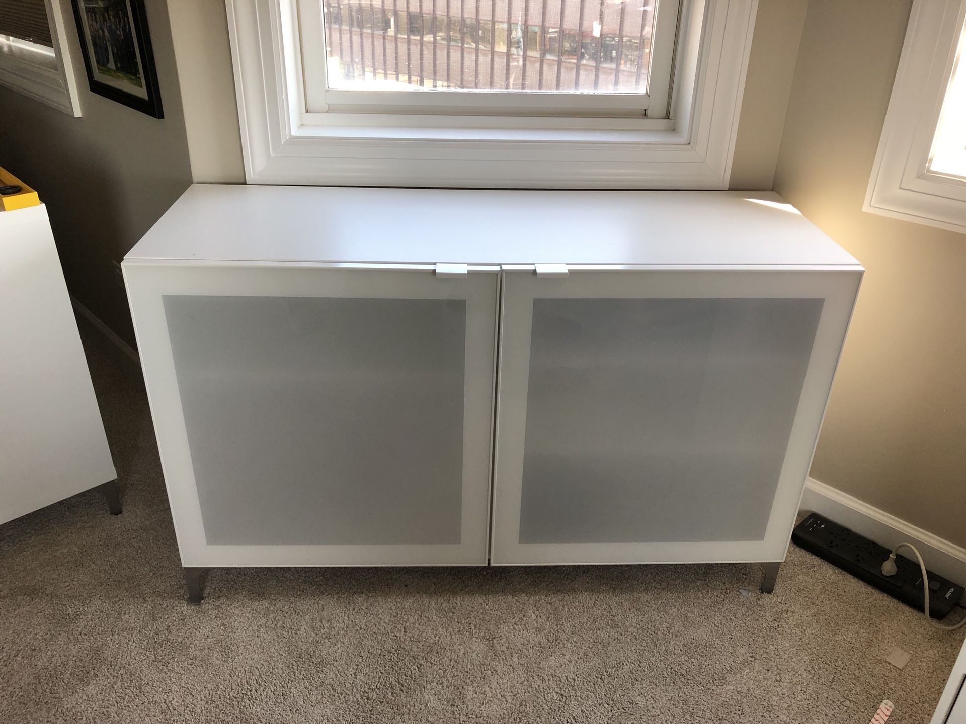 IKEA BESTA white storage cabinet with glass doors