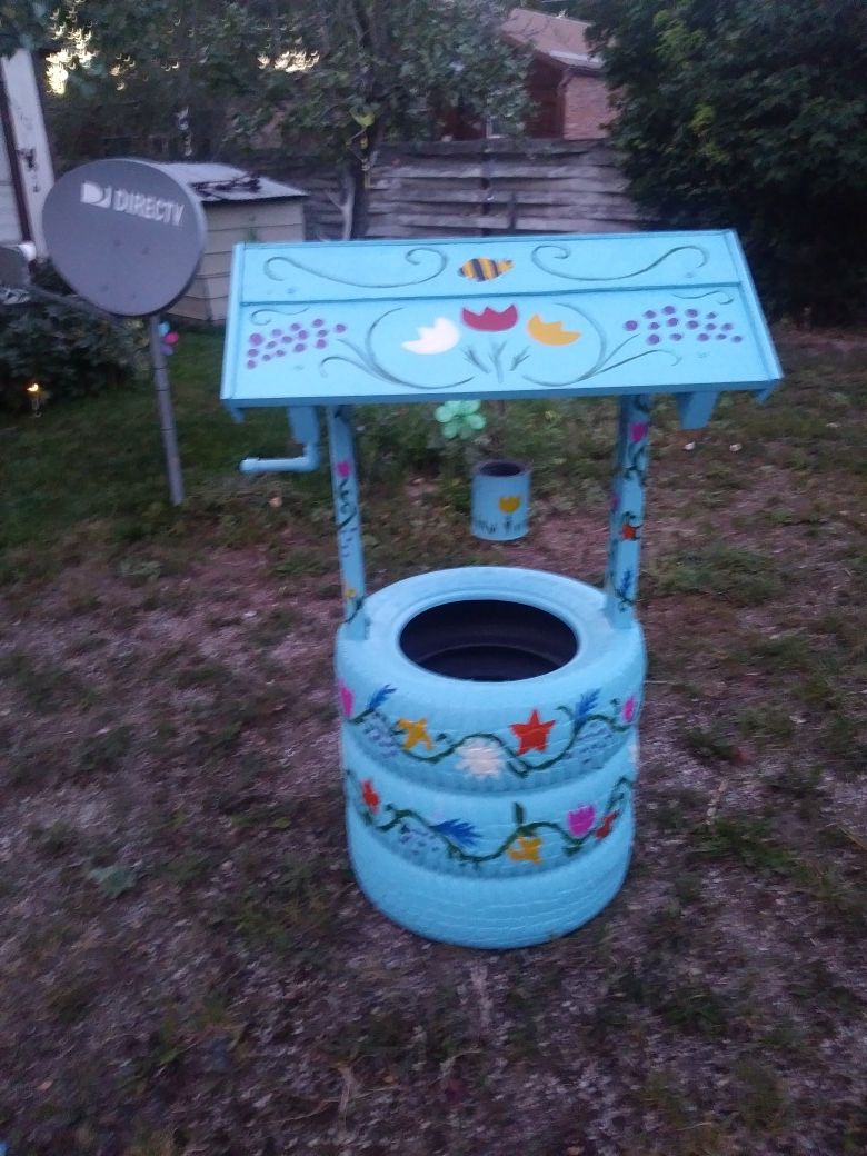 Wishing well tire planter