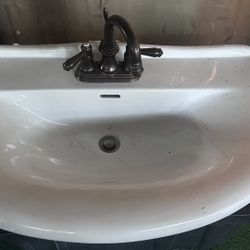 Bathroom sink with faucet