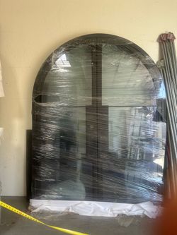 Iron round arch door bronze
