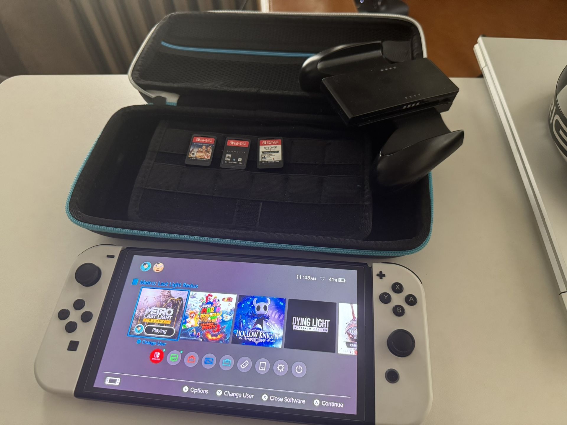 Nintendo Switch OLED + 4 Games