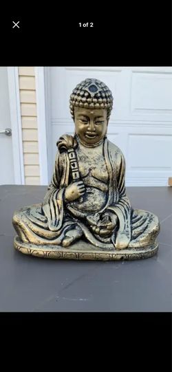 Buddha Holding butterfly statue