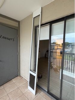 Pet door for sliding doors