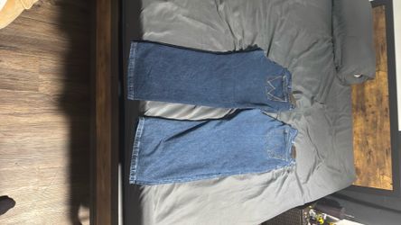 Pair of wranglers one light wash and one dark wash