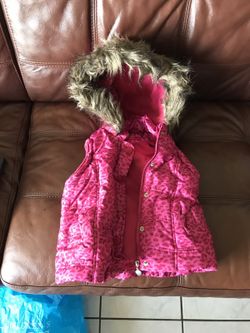 Sleeveless winter jacket with nice hoodie. Excellent condition and barely used.