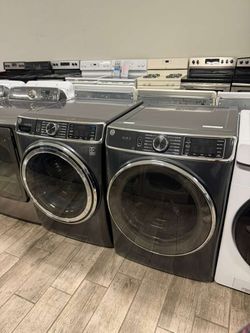 GE Profile Mega capacity washer and dryer set electric with warranty