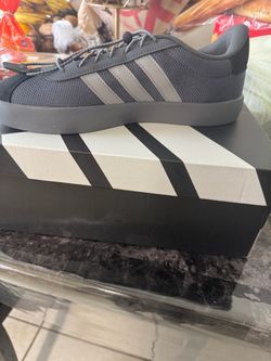 Adidas shoes and jeans