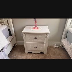 Two small beds with dresser and Nightstand