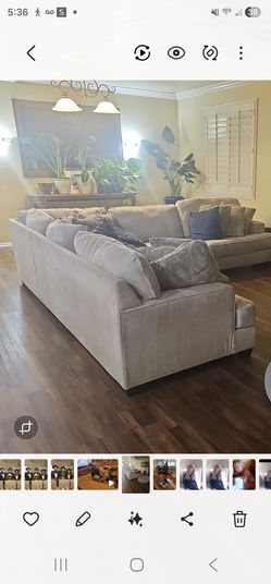 Beige Ashley furniture l-shaped couch