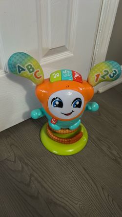 Fisher-Price DJ Bouncin’ Beats Electronic Baby & Toddler Learning Toy with Bouncing Action