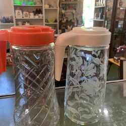 1960s1970s TANG PITCHERS. 14.00 each.  Johanna at Antiques and More. Located at 316b Main Street Buda. Antiques vintage retro furniture collectibles m