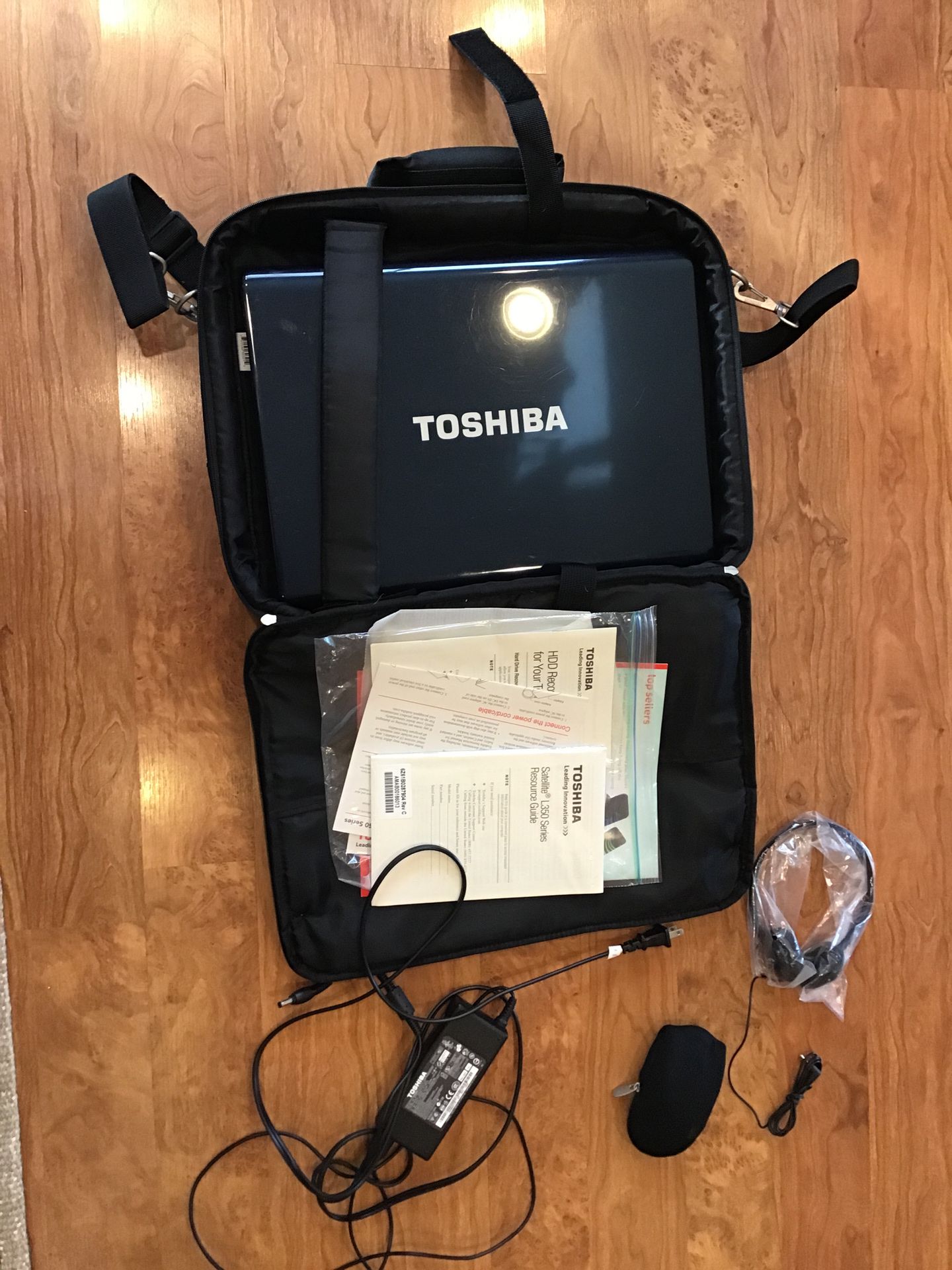 Toshiba laptop, case, mouse, headphones