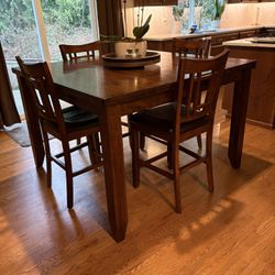 Bar Height Table And 8 Chairs