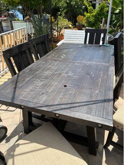 Wooden table with matching set of 6 chairs