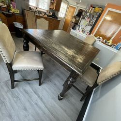 Dining table and 4 chairs