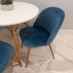 Modern round dining table set.