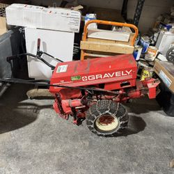 Gravely 812 Professional walk-behind tractor with snow plow attachment 