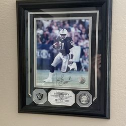 Autographed Tim Brown wall mounted picture
