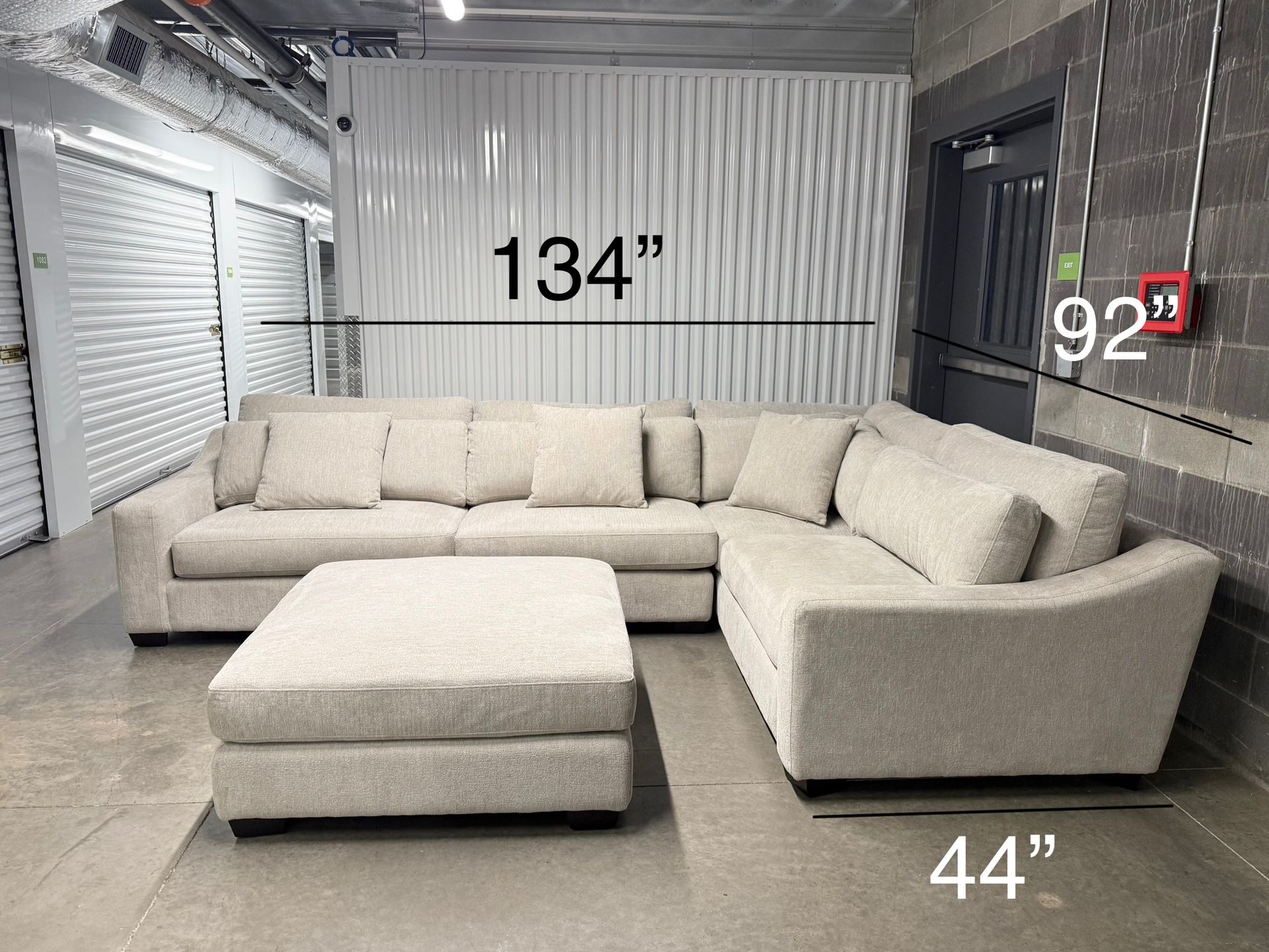 Brand New XL Seat Evelynne Fabric Sectional with Ottoman - Delivery Available 