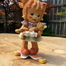 1994 Enesco "No Strings Attached" figurine.