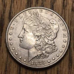 1883 Silver Morgan Dollar.  Almost Uncirculated 