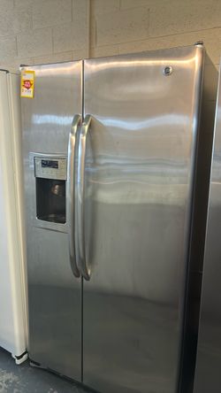 Like new GE side by side refrigerator